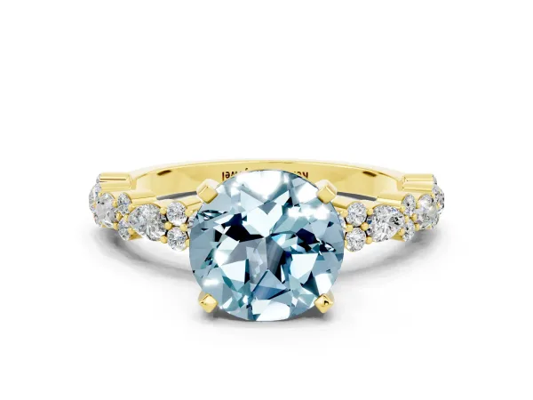 Round Cut Aquamarine Side Stone Solitaire Ring with Round and Four-Prong Setting Yellow gold