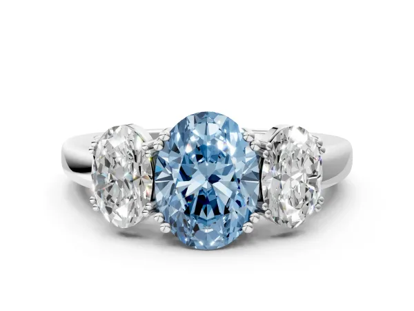 Fancy Blue Three-Stone Oval Cut Cut Diamond Ring with Channel Set Band and Four-Prong Setting Platinum