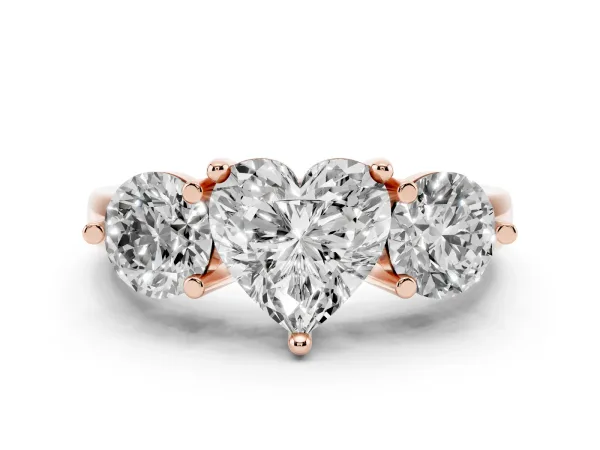 Three-Stone Heart Cut Brilliant Cut Solitaire Ring with Prong Setting on a Classic Band Rose gold