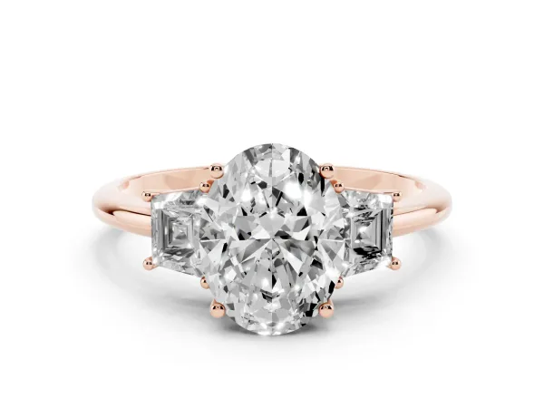 Oval Cut Diamond Three-Stone Ring with Trapezoid Side Stones and Prong Setting Rose gold