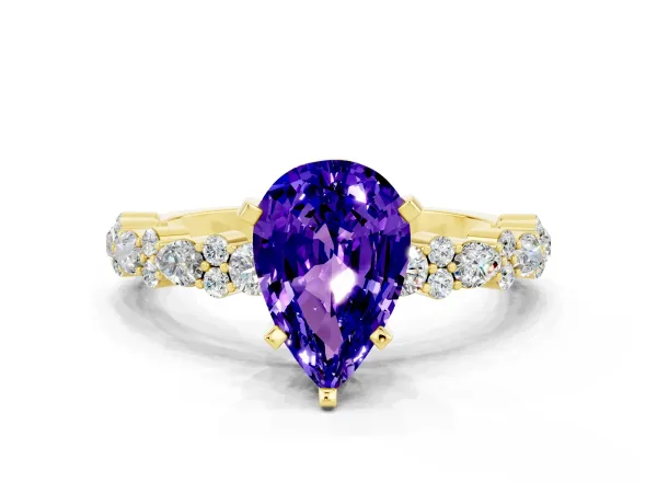 Pear Cut Tanzanite Side Stone Solitaire Ring with Round and Four-Prong Setting Yellow gold