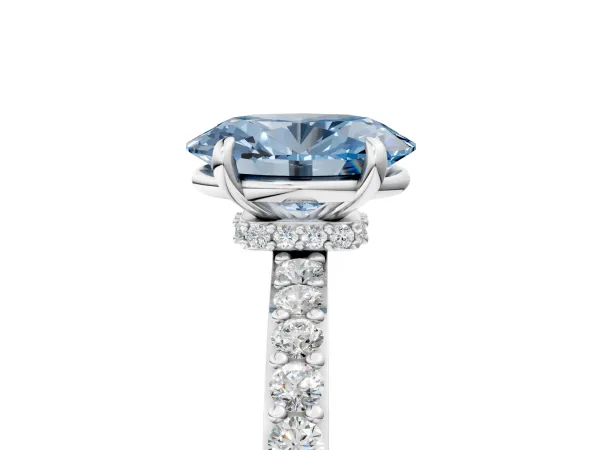 Fancy Blue Oval Cut Diamond Solitaire Engagement Ring with Pavé Band and Four-Prong Setting Platinum