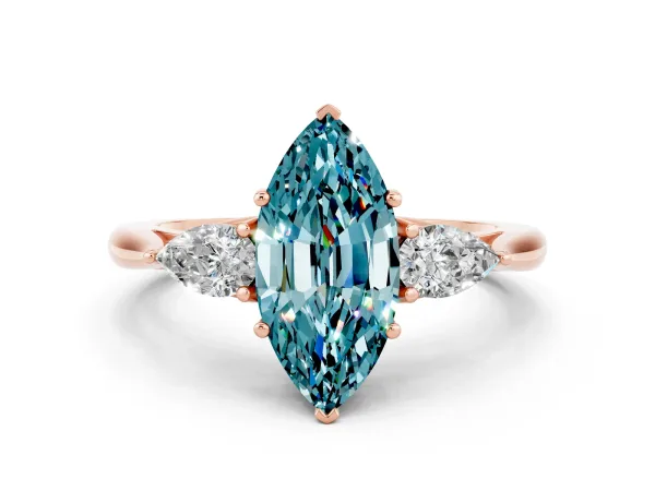 Marquise Cut Blue Topaz Three-Stone Ring with Pear Side Stones and Prong Setting Rose gold