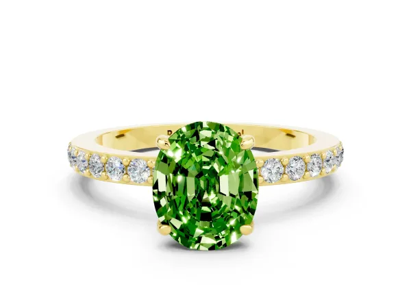 Oval Cut Peridot Solitaire Engagement Ring with Pavé Band and Four-Prong Setting Yellow gold