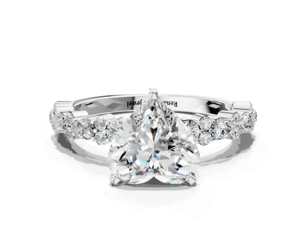 Heart Cut Diamond Side Stone Solitaire Ring with Round and Four-Prong Setting Platinum