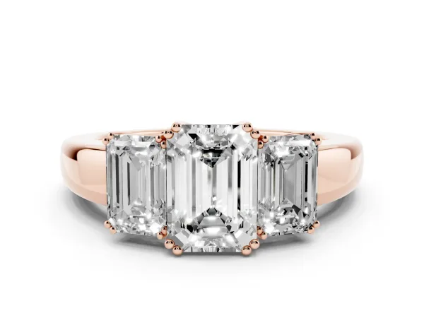 Three-Stone Emerald Cut Cut Diamond Ring with Channel Set Band and Four-Prong Setting Rose gold