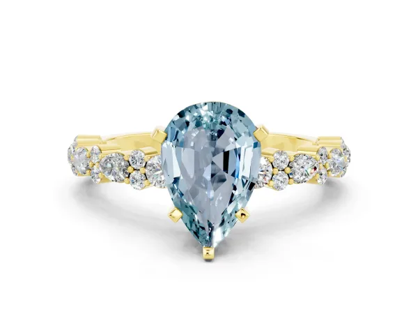 Pear Cut Aquamarine Side Stone Solitaire Ring with Round and Four-Prong Setting Yellow gold