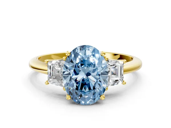 Fancy Blue Oval Cut Diamond Three-Stone Ring with Trapezoid Side Stones and Prong Setting Yellow gold