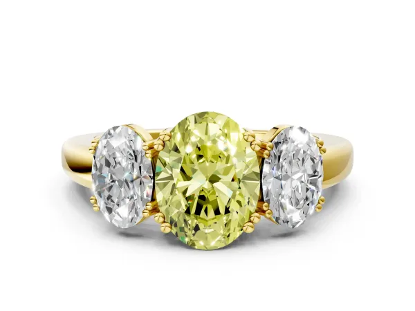 Fancy Yellow Three-Stone Oval Cut Cut Diamond Ring with Channel Set Band and Four-Prong Setting Yellow gold