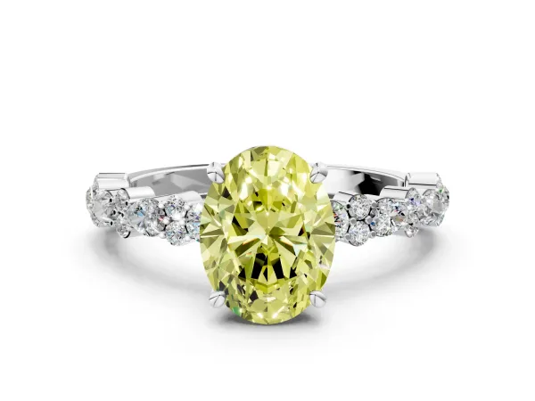 Fancy Yellow Oval Cut Diamond Side Stone Solitaire Ring with Round and Four-Prong Setting White gold