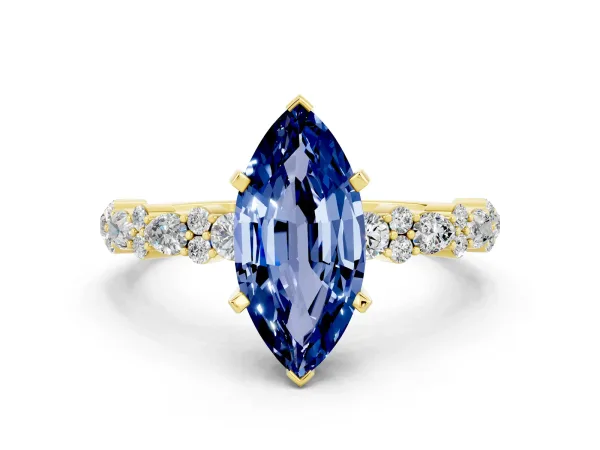 Marquise Cut Blue Sapphire Side Stone Solitaire Ring with Round and Four-Prong Setting Yellow gold