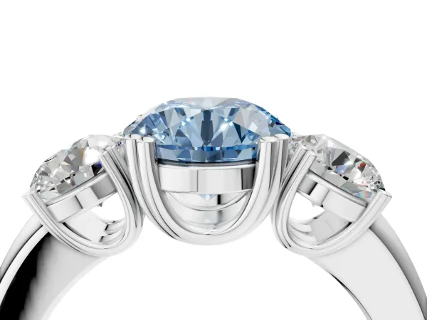 Fancy Blue Three-Stone Round Cut Cut Diamond Ring with Channel Set Band and Four-Prong Setting White gold