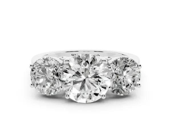 Three-Stone Round Cut Diamond Engagement Ring with Prong Setting on a Classic Band White gold