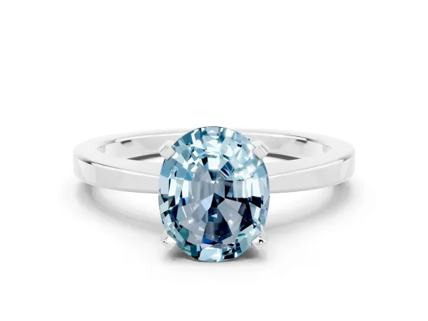 Oval Cut Aquamarine Solitaire Engagement Ring with Classic Band and Four-Prong Setting Silver