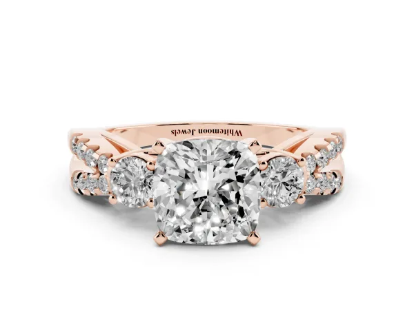 Cushion Cut Diamond Three-Stone Ring with Pavé Split Shank and Four-Prong Setting Rose gold