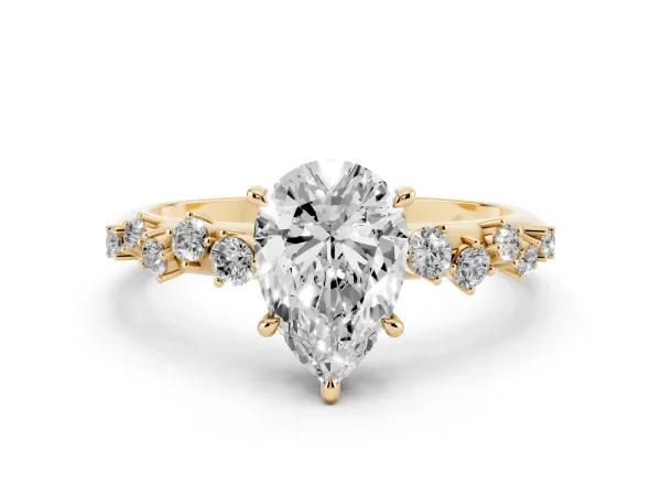 Pear Cut Diamond Cluster Side Stone Solitaire Ring with Prong Setting Yellow gold