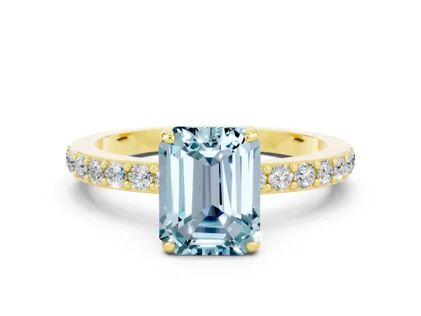 Emerald Cut Aquamarine Solitaire Engagement Ring with Pavé Band and Four-Prong Setting Yellow gold