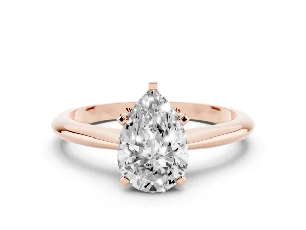 Pear Cut Cut Solitaire Ring with Four-Prong Setting on a Classic Band Rose gold