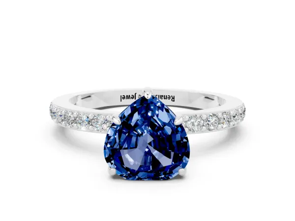 Heart Cut Blue Sapphire Pavé Engagement Ring with Round Accents and Prong Setting Silver