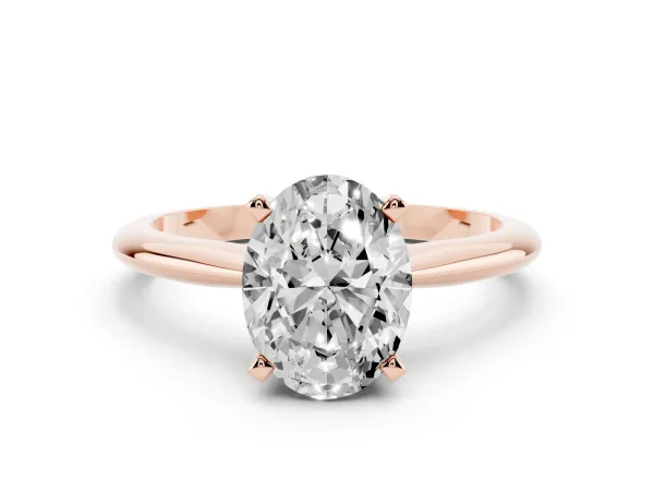 Oval Cut Cut Solitaire Ring with Four-Prong Setting on a Classic Band Rose gold