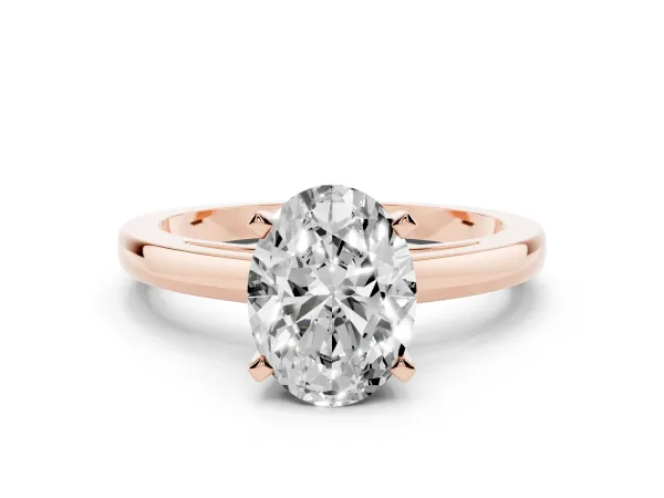 Oval Cut Solitaire Diamond Engagement Ring with Four-Prong Setting on a Classic Band Rose gold