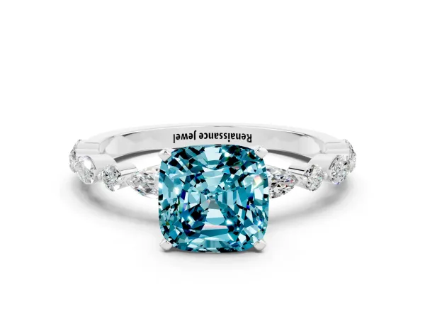 Cushion Cut Blue Topaz Ring with Marquise and Round Side Stones and Four-Prong Setting White gold