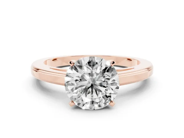 Round Cut Solitaire Diamond Ring with Four-Prong Setting and Classic Band Rose gold