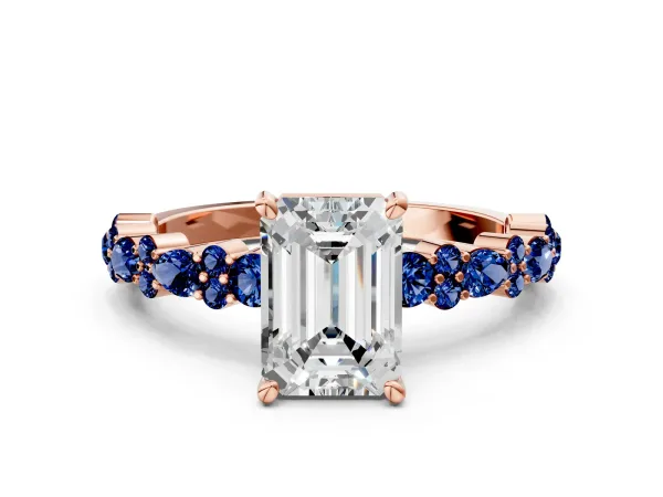 Emerald Cut Diamond Side Stone Solitaire Ring with Round Blue Sapphire and Four-Prong Setting Rose gold