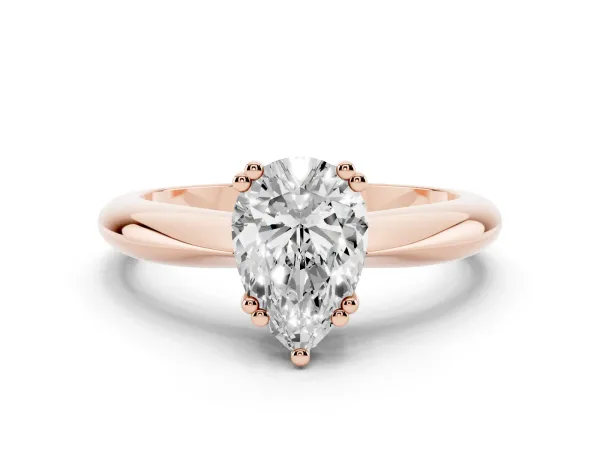 Pear Cut Cut Solitaire Engagement Ring with Tapered Band and Four-Prong Setting Rose gold