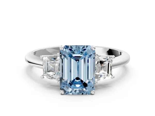 Fancy Blue Emerald Cut Diamond Three-Stone Ring with Trapezoid Side Stones and Prong Setting Platinum