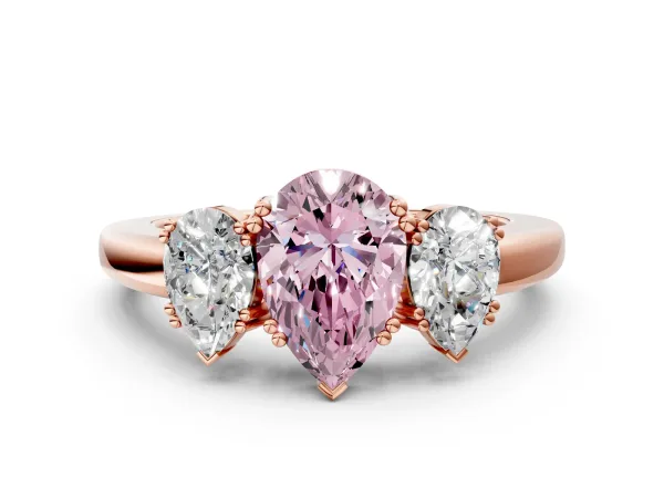 Fancy Pink Three-Stone Pear Cut Cut Diamond Ring with Channel Set Band and Four-Prong Setting Rose gold
