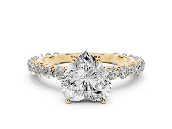 Heart Cut Cut Diamond Solitaire Ring with U-Prong Diamond Band and Four Prong Setting Yellow gold