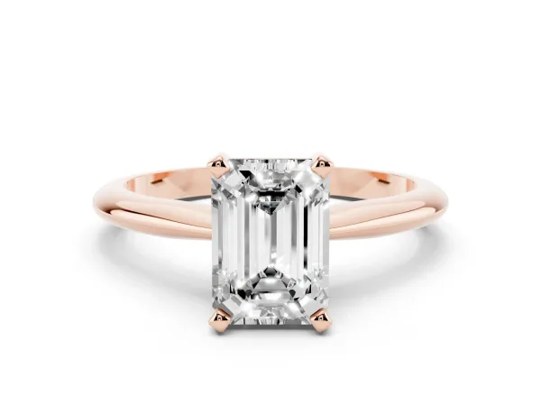 Emerald Cut Cut Solitaire Ring with Four-Prong Setting on a Classic Band Rose gold