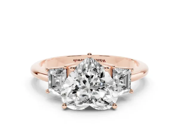 Heart Cut Diamond Three-Stone Ring with Trapezoid Side Stones and Prong Setting Rose gold
