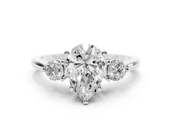 Three-Stone Pear Cut Solitaire Ring with Tapered Band and Four-Prong Setting Platinum