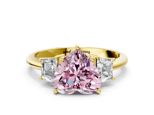 Fancy Pink Heart Cut Diamond Three-Stone Ring with Trapezoid Side Stones and Prong Setting Yellow gold