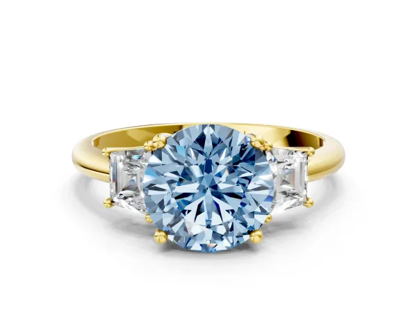 Fancy Blue Round Cut Diamond Three-Stone Ring with Trapezoid Side Stones and Prong Setting Yellow gold