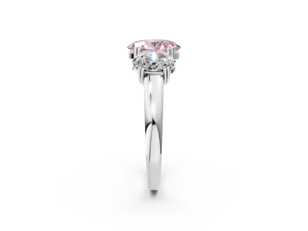 Fancy Pink Three-Stone Oval Cut Cut Diamond Ring with Channel Set Band and Four-Prong Setting Platinum