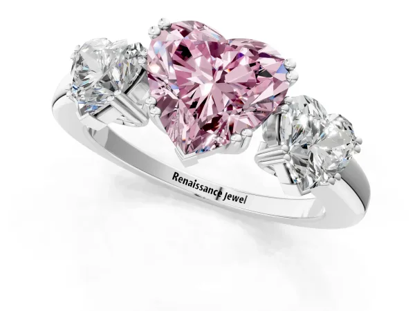 Fancy Pink Three-Stone Heart Cut Cut Diamond Ring with Channel Set Band and Four-Prong Setting Platinum