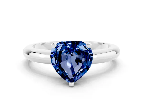 Heart Cut Blue Sapphire Solitaire Engagement Ring with Round Band and Four-Prong Setting Silver