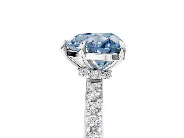 Fancy Blue Heart Cut Diamond Solitaire Engagement Ring with Pavé Band and Four-Prong Setting Platinum