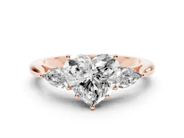 Three-Stone Heart Cut Brilliant Diamond Solitaire Ring with Tapered Band and Four-Prong Setting Rose gold