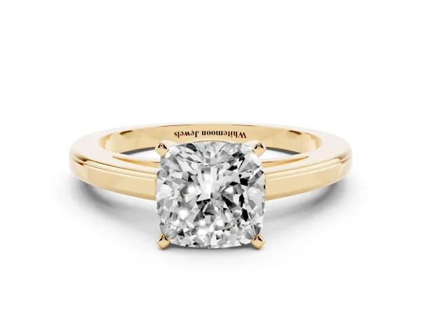 Cushion Cut Solitaire Diamond Ring with Four-Prong Setting and Classic Band Yellow gold