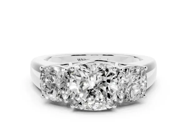 Three-Stone Cushion Cut Cut Diamond Ring with Prong Setting and Classic Band Platinum