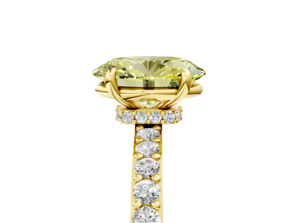 Fancy Yellow Oval Cut Diamond Solitaire Engagement Ring with Pavé Band and Four-Prong Setting Yellow gold