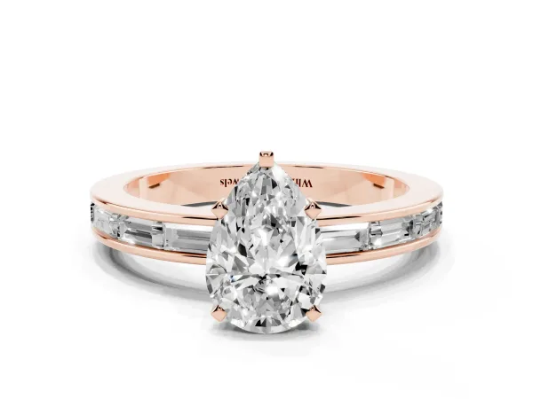 Pear Cut Solitaire Diamond Ring with Channel-Set Baguette Band and Four-Prong Setting Rose gold