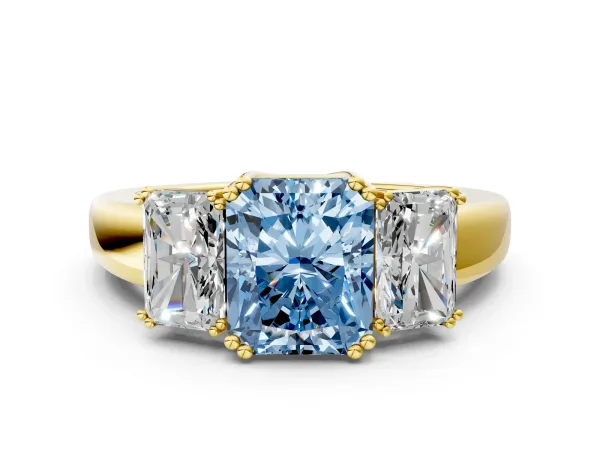 Fancy Blue Three-Stone Radiant Cut Cut Diamond Ring with Channel Set Band and Four-Prong Setting Yellow gold