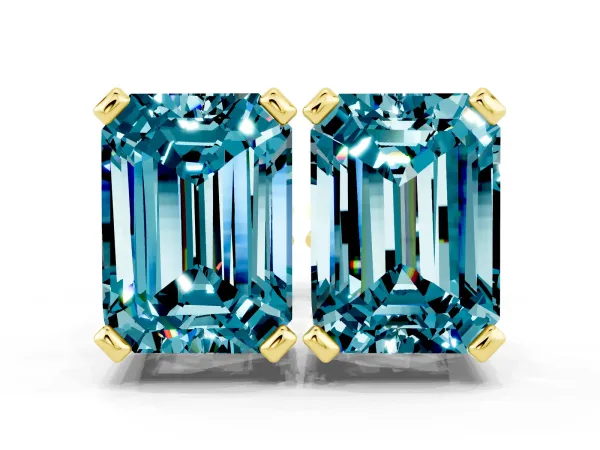 Emerald Cut Blue Topaz Stud Earrings Yellow gold