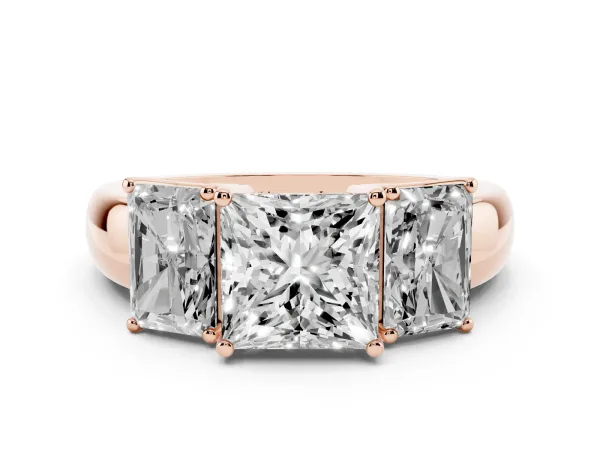 Three-Stone Princess Cut Diamond Ring with Emerald Side Stones and Prong Setting Rose gold