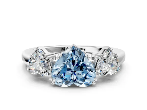 Fancy Blue Three-Stone Heart Cut Cut Diamond Ring with Channel Set Band and Four-Prong Setting White gold